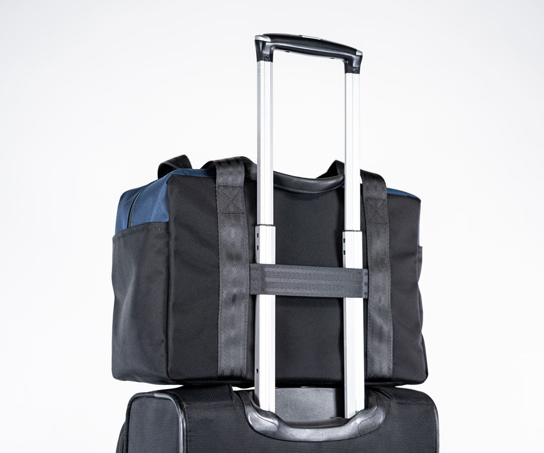 Pass-through band to slip on carry-on handles