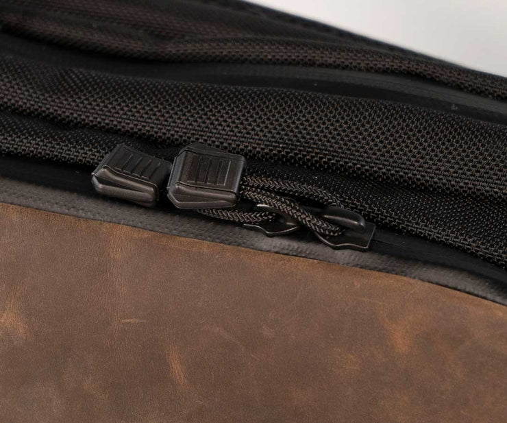 Big, grippy  zipper pulls are big enough for gloved hands to zip open